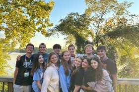 Group of people celebrating on stage