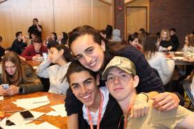 Group of people celebrating on stage