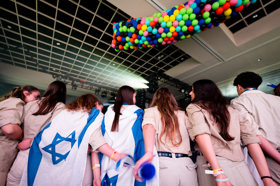 Group of people celebrating on stage