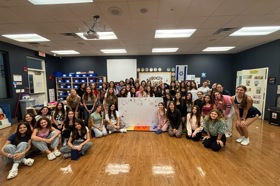 Group of people celebrating on stage