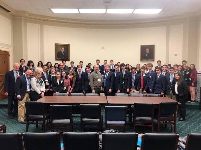 Group of people celebrating on stage