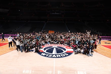 Group of people celebrating on stage