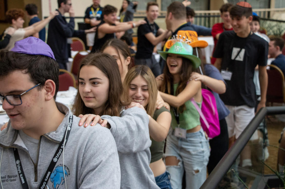 Group of people celebrating on stage