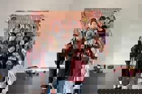 Group of people celebrating on stage