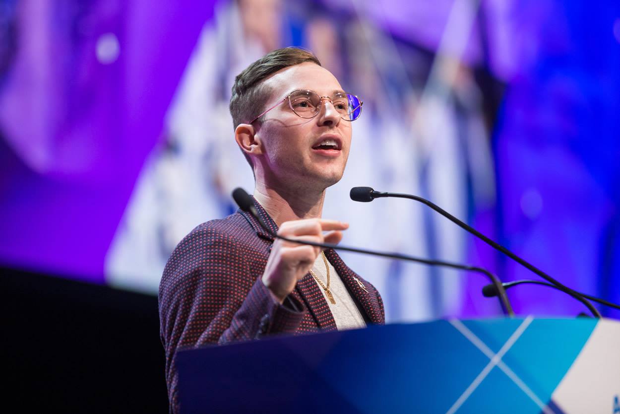 Group of people celebrating on stage