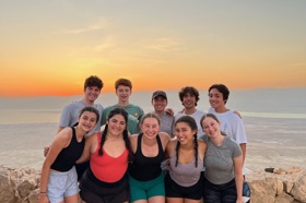 Group of people celebrating on stage