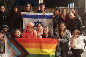 Group of people celebrating on stage