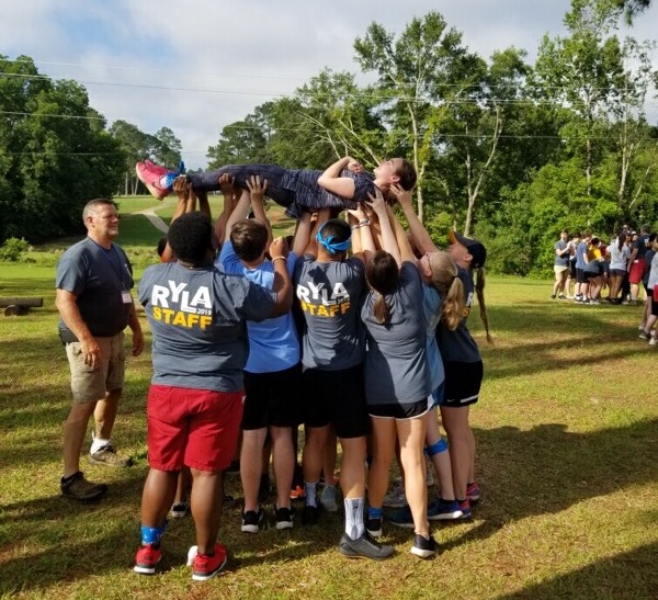 Group of people celebrating on stage