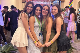 Group of people celebrating on stage