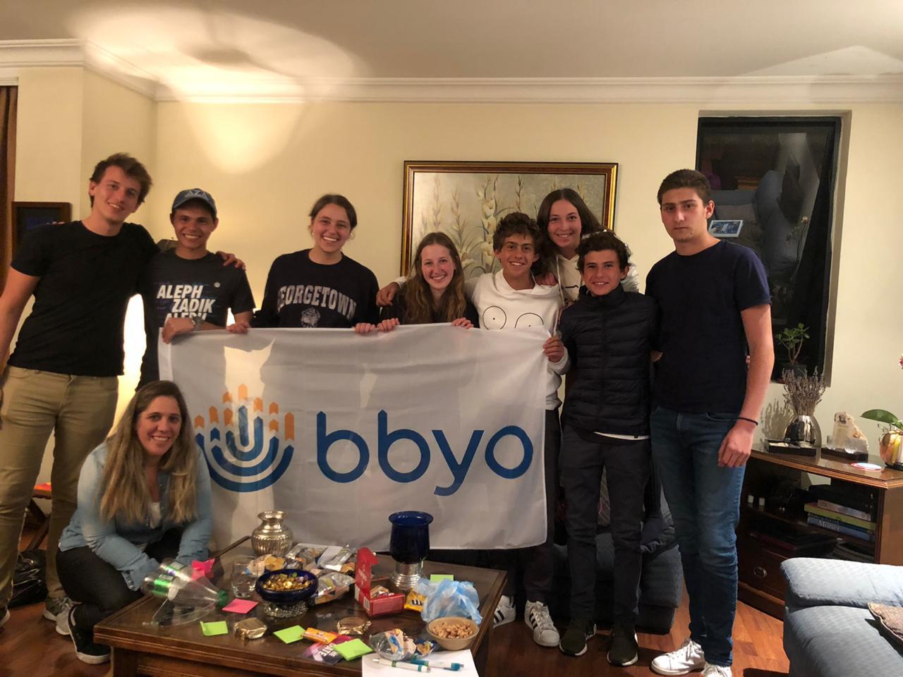 Group of people celebrating on stage