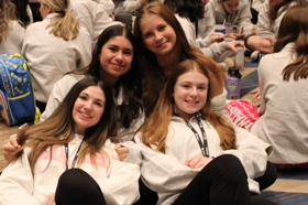 Group of people celebrating on stage