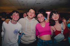 Group of people celebrating on stage