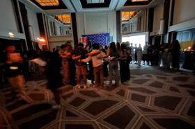 Group of people celebrating on stage