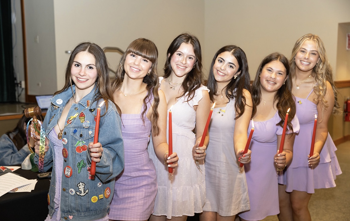 Group of people celebrating on stage