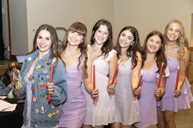 Group of people celebrating on stage