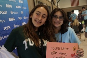 Group of people celebrating on stage