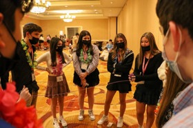 Group of people celebrating on stage