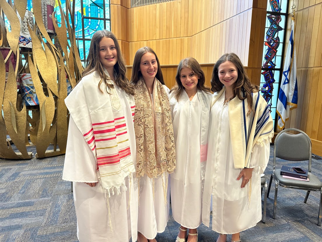 Group of people celebrating on stage