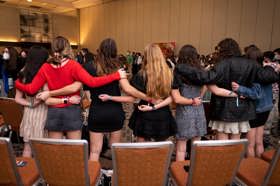 Group of people celebrating on stage
