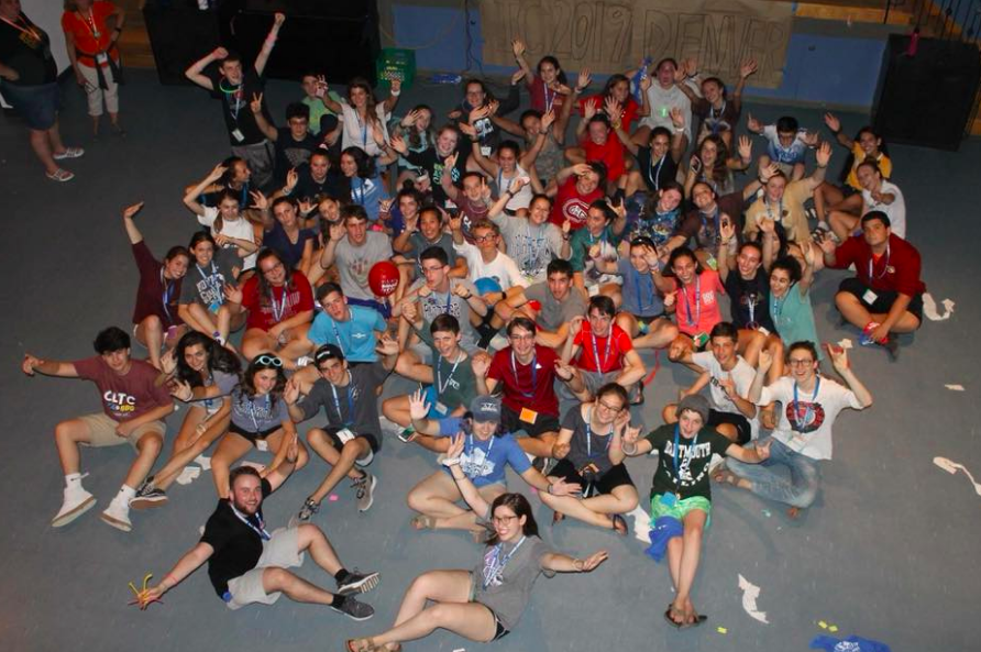 Group of people celebrating on stage