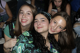 Group of people celebrating on stage