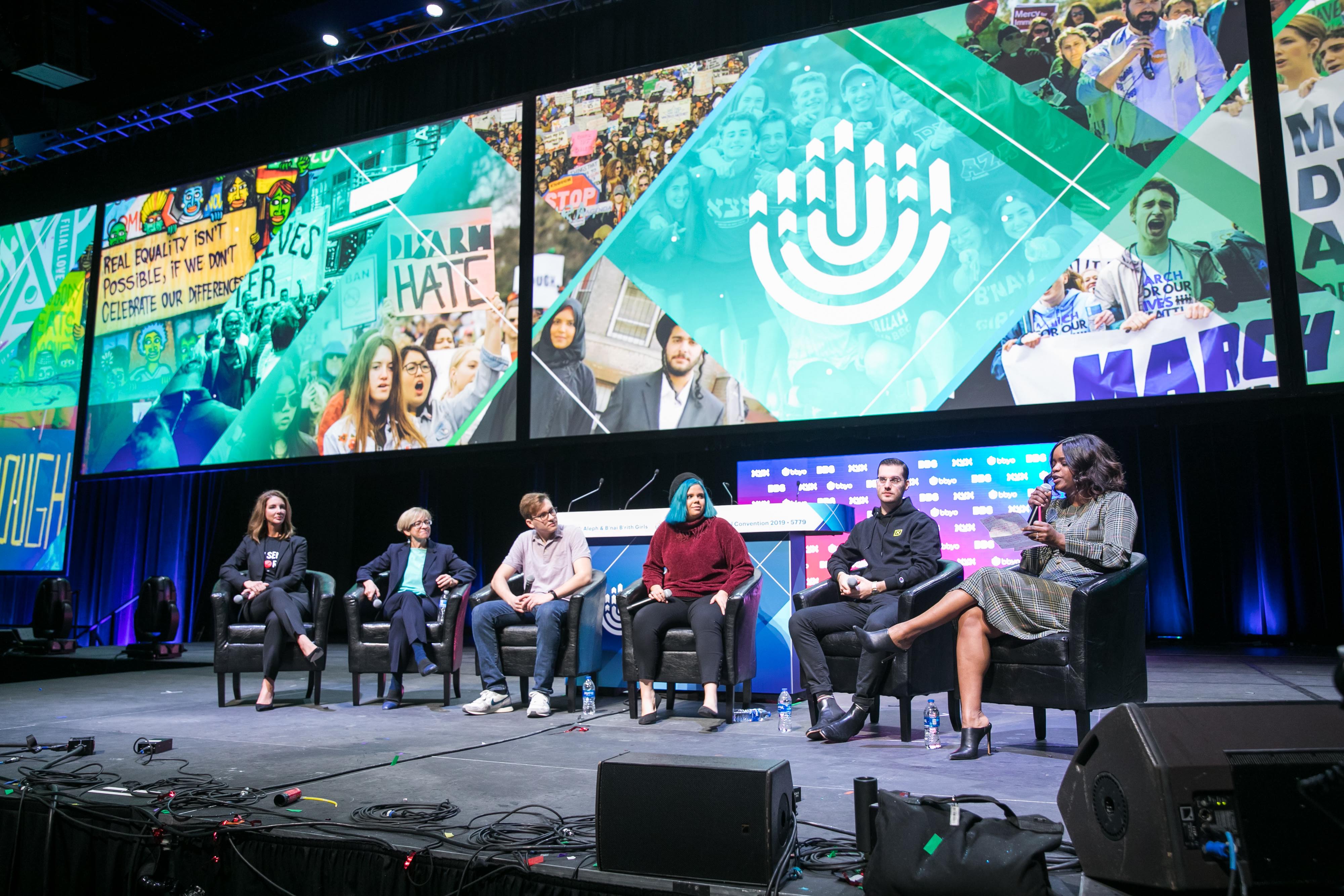 Group of people celebrating on stage