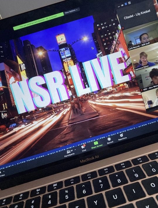 Group of people celebrating on stage