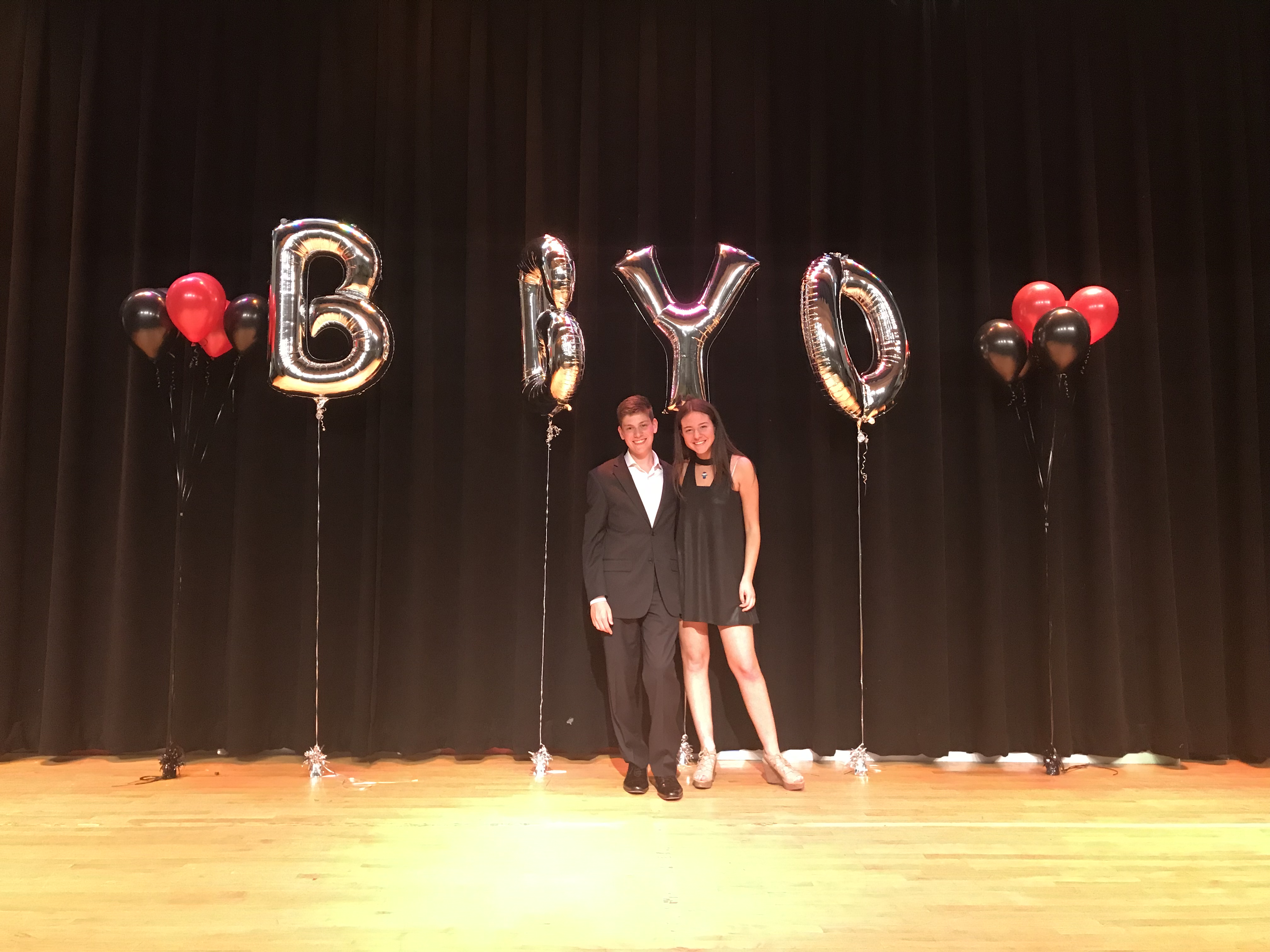 Group of people celebrating on stage