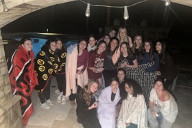 Group of people celebrating on stage