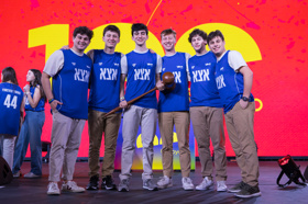 Group of people celebrating on stage