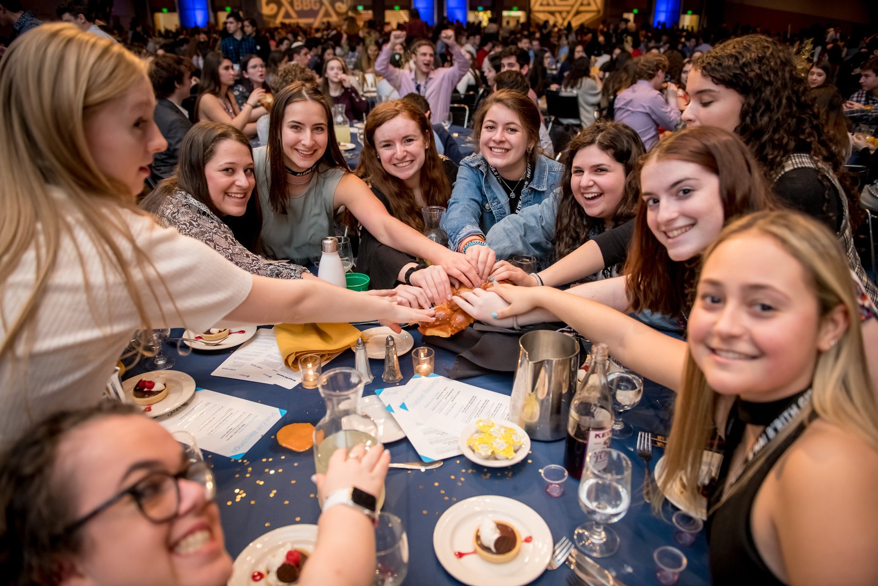 Group of people celebrating on stage