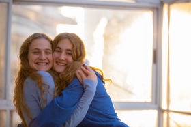 Group of people celebrating on stage