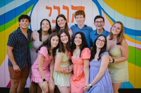 Group of people celebrating on stage