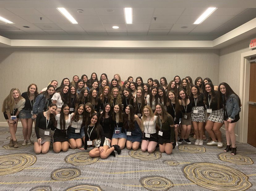 Group of people celebrating on stage