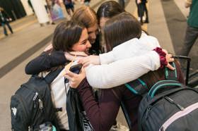 Group of people celebrating on stage