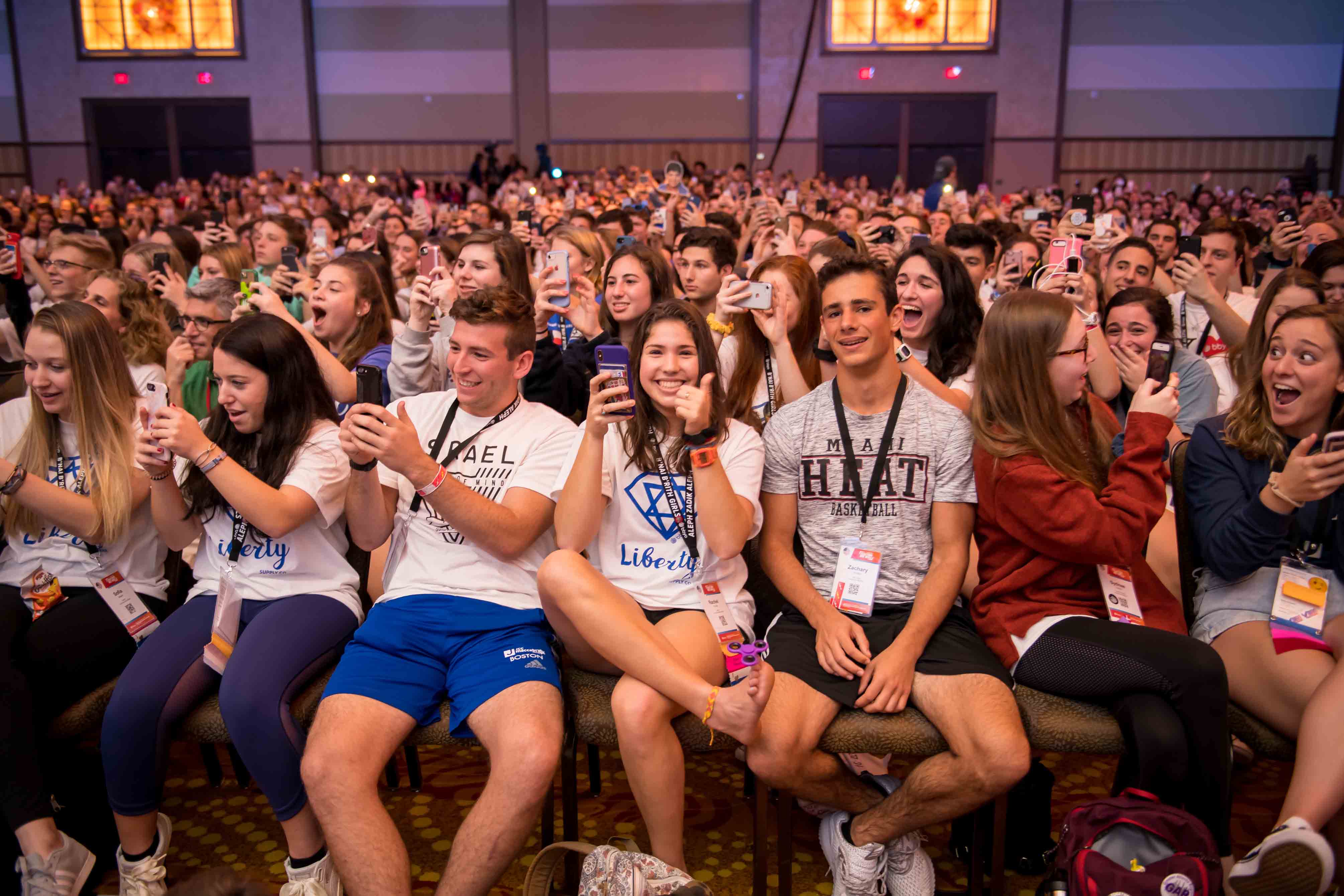 Group of people celebrating on stage