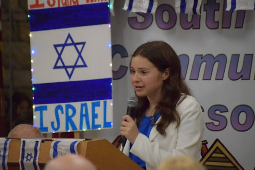 Group of people celebrating on stage
