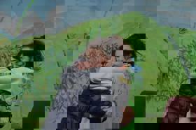 Group of people celebrating on stage