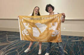 Group of people celebrating on stage