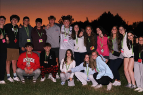 Group of people celebrating on stage