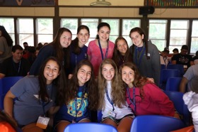 Group of people celebrating on stage