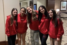 Group of people celebrating on stage