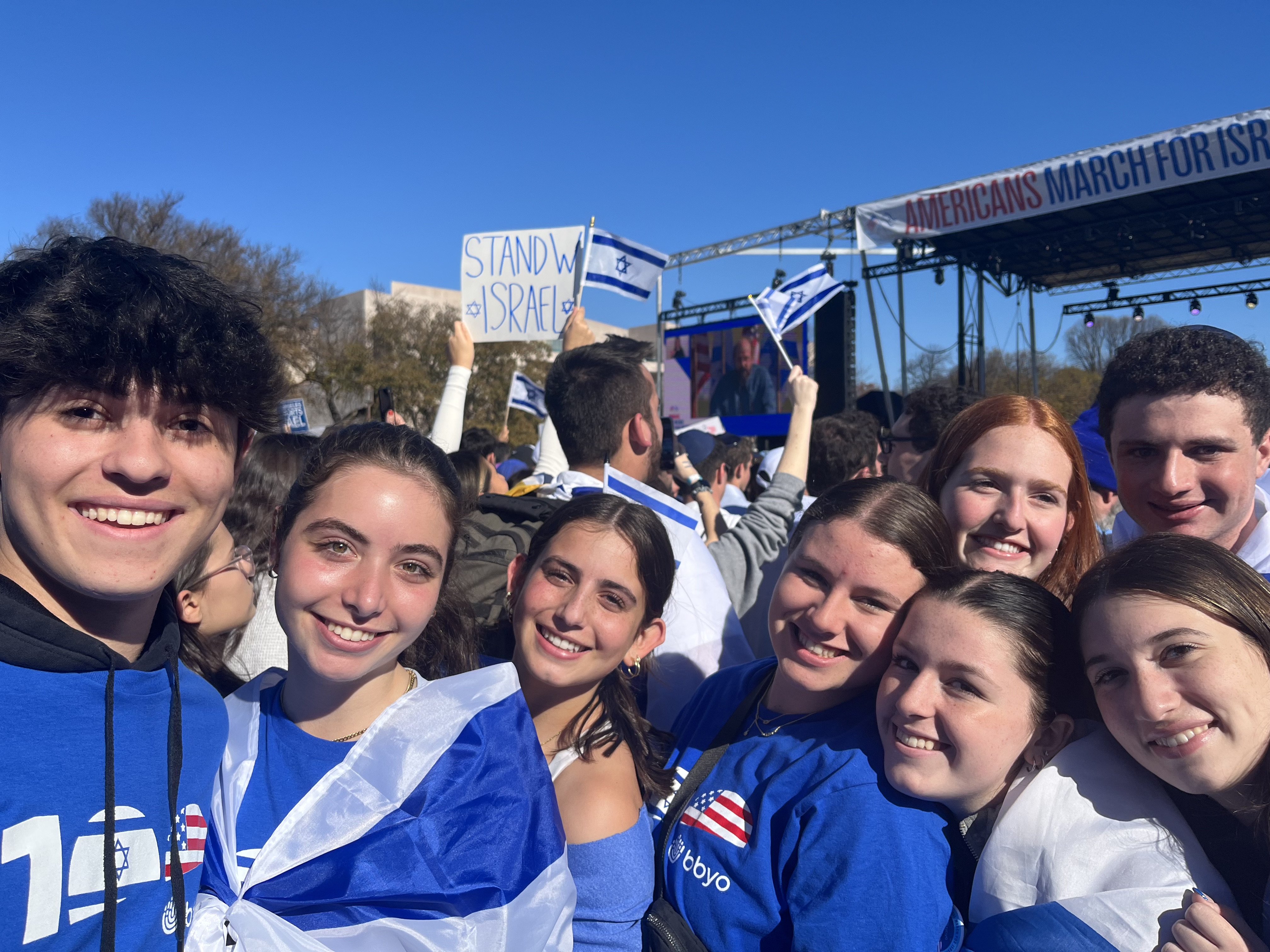 Group of people celebrating on stage