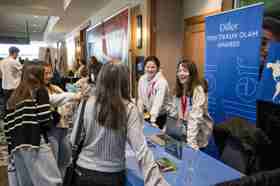 Group of people celebrating on stage