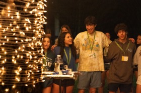 Group of people celebrating on stage