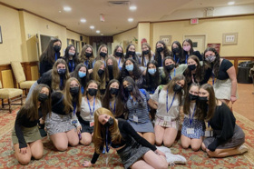 Group of people celebrating on stage