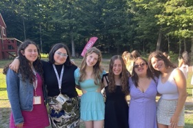 Group of people celebrating on stage