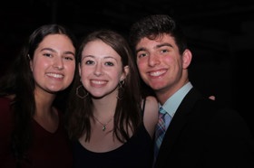 Group of people celebrating on stage