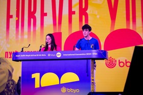 Group of people celebrating on stage