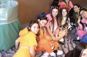 Group of people celebrating on stage